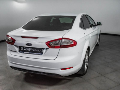 Ford Mondeo 2.0d AT (140 л.с.)